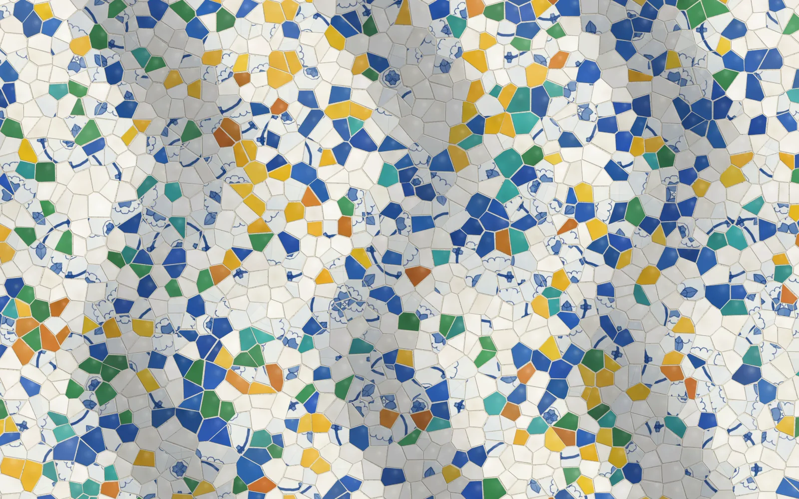 A mosaic of broken tile shards in white, cobalt, yellow, green and orange, set in pale lime mortar, with fragments of blue painted rosettes among the plain pieces, shaded as if lying on a surface that swells and dips